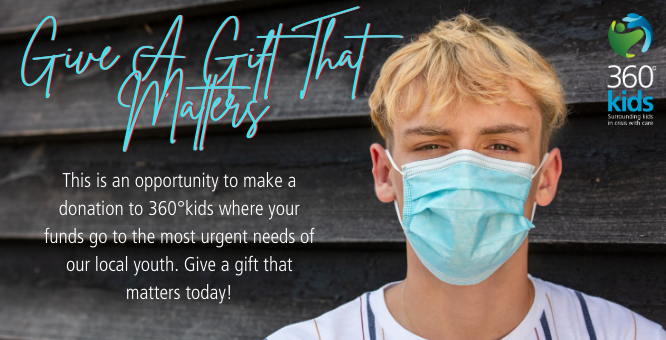 boy wearing blue face mask